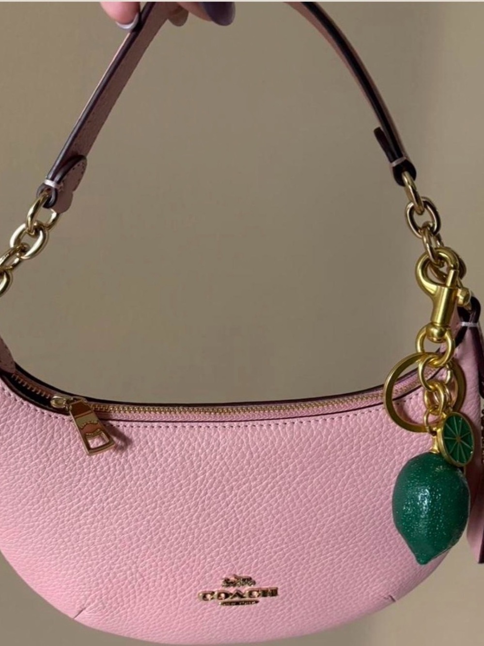 Coach Pink Pebbled Leather Crescent Shoulder Bag with Green Charm